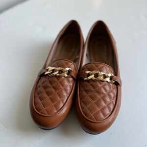 brown flats with gold chain